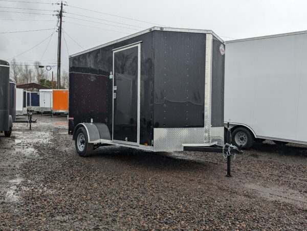 2024 E-Series By Cargo Mate 6x12 Single axle Enclosed Cargo Trailer Ramp Door Extra Height D-rings Jacks in Rear! With RV Side Door
