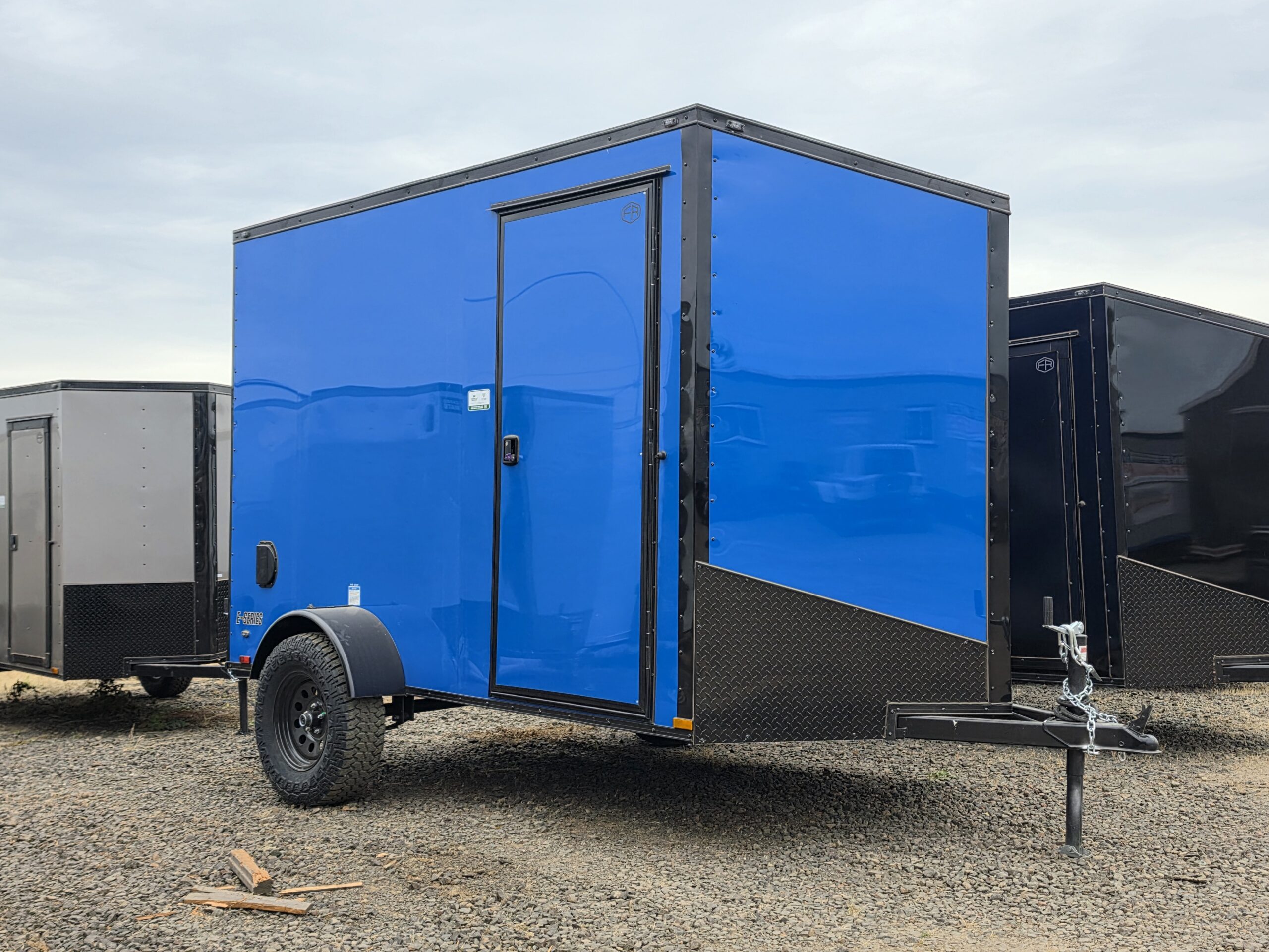 2027 Cargo Mate Enclosed Cargo Trailer 6x10 Ramp Door 1-Piece Roof Polycore